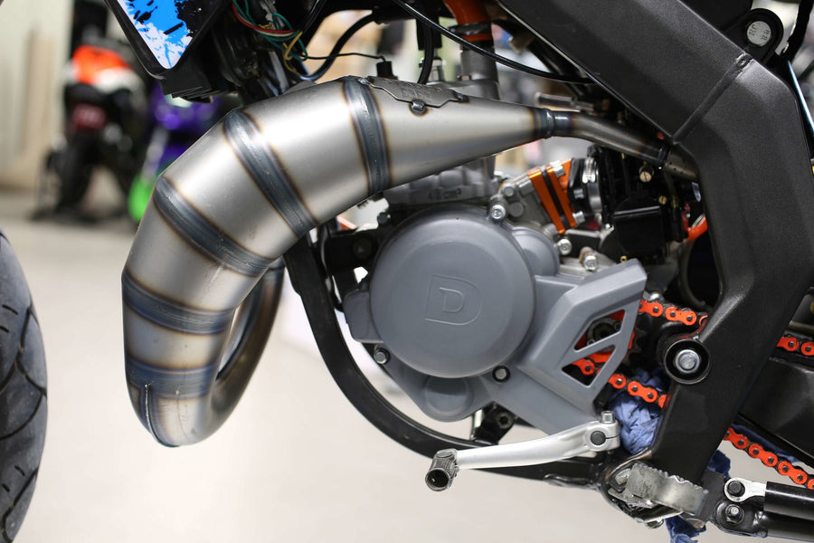 Aprilia SX SM 50 2T D50B0 [2007–] - Auspuff 70cc CNC orange