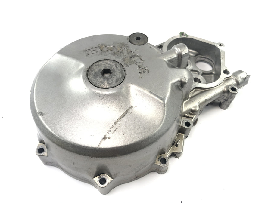 Honda NX 650 RD08 [1995] - Embrague de cubierta del generador de la cubierta alternadora a la izquierda