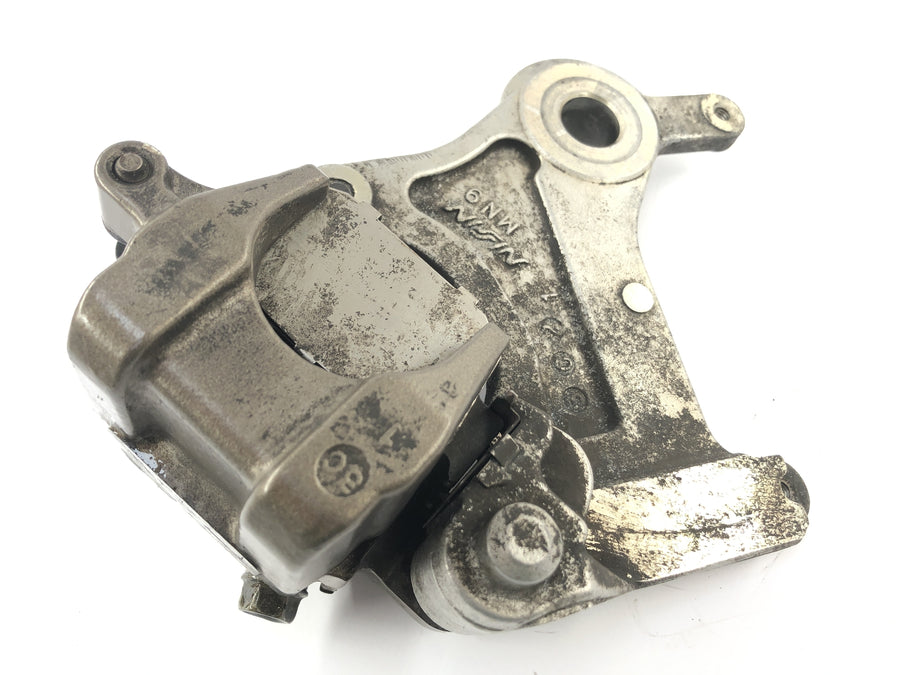 Honda NX 650 RD02 [1989] - Calibre de freno en la parte posterior con placa de anclaje