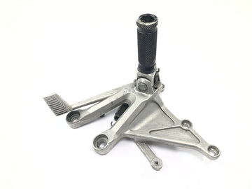 Honda CBR 1000 RR SC57 [2006] - Reposapiés del conductor derecho con sistema de reposapiés con pedal de freno - 0