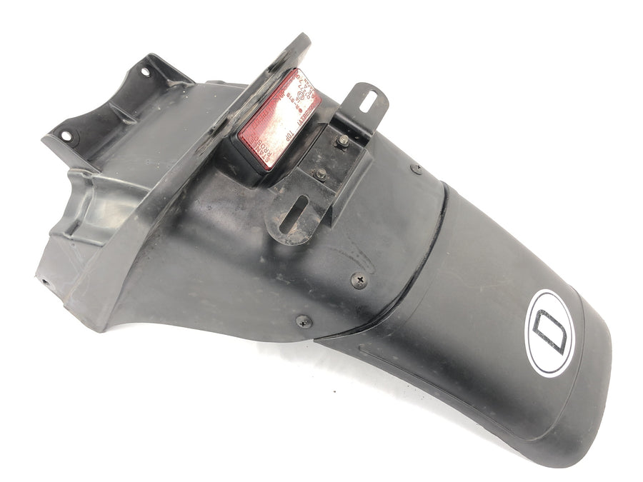 Kawasaki ZX -10 ZXT00B [1990] - Protección de salpicaduras en el soporte trasero de la matrícula