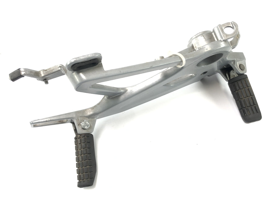 Honda SLR 650 RD09 [1997] - Sistema de reposapiés en el soporte del reposapiés derecho