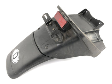 Kawasaki ZX -10 ZXT00B [1990] - Protección de salpicaduras en el soporte trasero de la matrícula