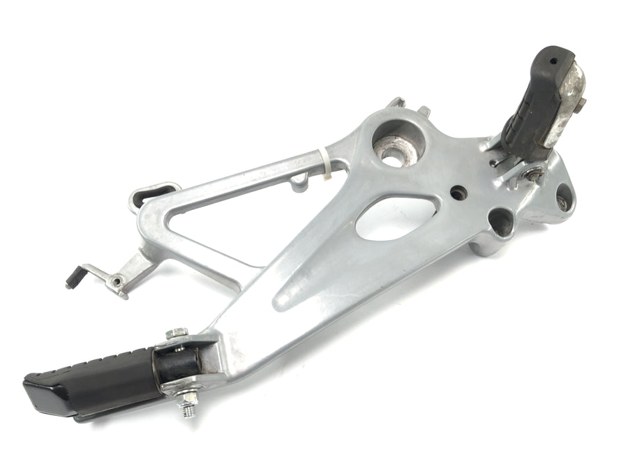 Honda SLR 650 RD09 [1997] - Sistema de reposapiés en el soporte del reposapiés derecho