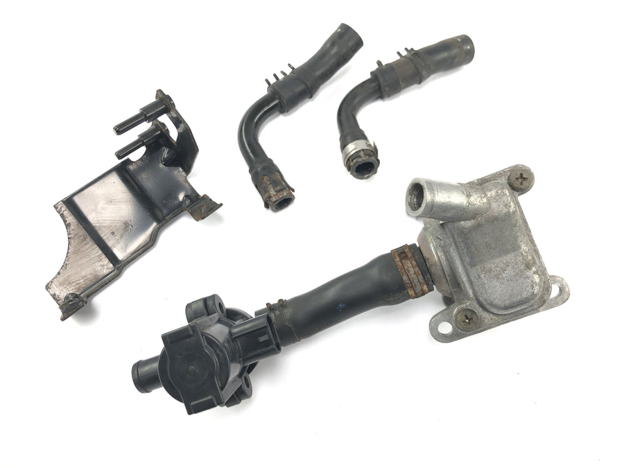 Triumph Bonneville T100 986MF [2012] - Sistema de aire secundario de válvula de aire secundario
