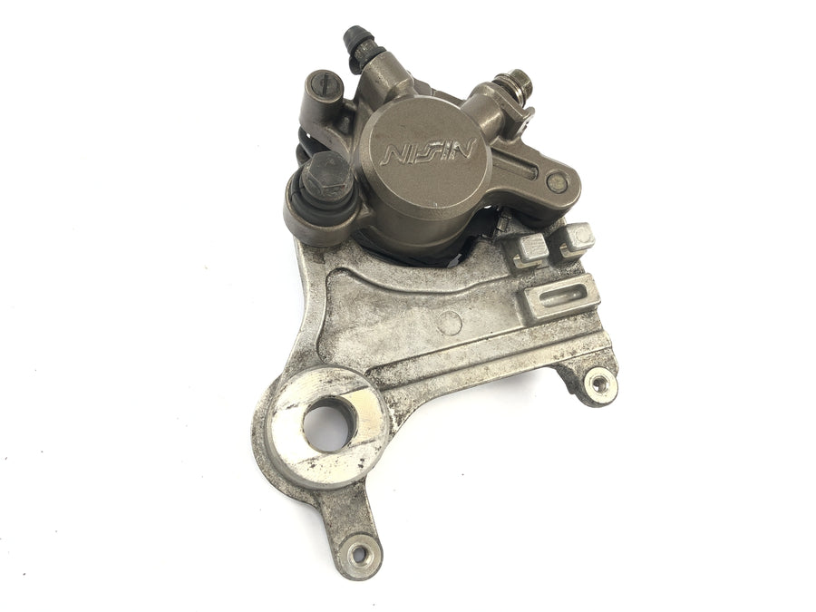 Honda NX 650 RD02 [1989] - Calibre de freno en la parte posterior con placa de anclaje