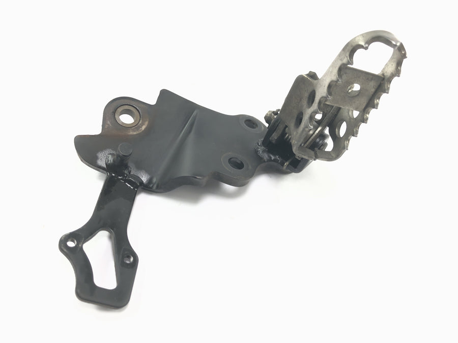 Yamaha WR 125 X DE07 [2010] - Reposapiés conductor izquierdo