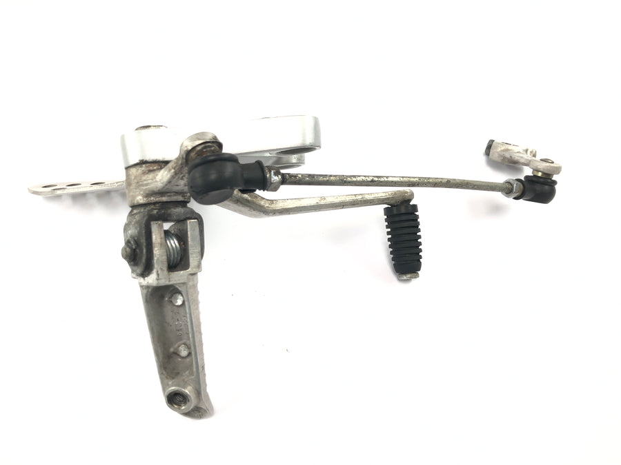 Suzuki GSX R 1000 WVBZ K3 [2003] - Sistema de reposapiés soporte reposapiés izquierdo del conductor con palanca de cambios