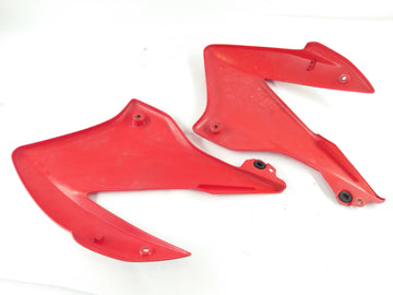 Honda XR 125 L JD19 [2005] - revestimiento lateral a la derecha e izquierda con crack - 0