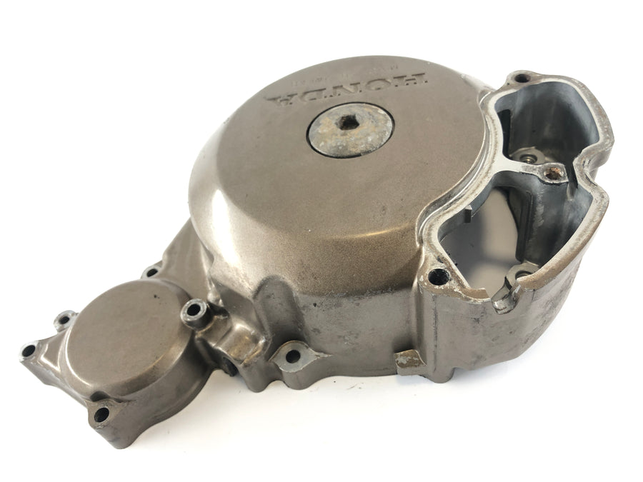 Honda XRV 750 África Twin RD04 [1993] - Tapa del motor en la cubierta de maquinaria de luz izquierda
